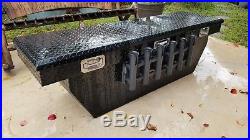 Husky truck tool box with fishing rod holders, key included