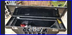 Husky truck tool box with fishing rod holders, key included