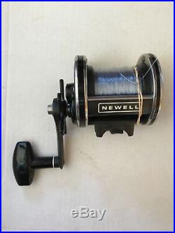 Newell fishing reel 338-5. 40 weight line with rod holder. Immaculate