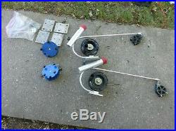 PAIR OF BIG JON DOWNRIGGERS WithCOUNTERS, SWIVEL BASES, STATIONARY BASES, ROD HOLDERS