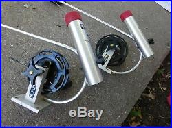 PAIR OF BIG JON DOWNRIGGERS WithCOUNTERS, SWIVEL BASES, STATIONARY BASES, ROD HOLDERS