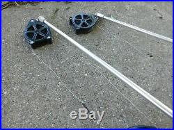 PAIR OF BIG JON DOWNRIGGERS WithCOUNTERS, SWIVEL BASES, STATIONARY BASES, ROD HOLDERS