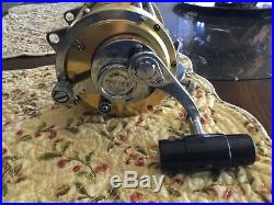 Penn International 50W Reel in good mechanical condition Includes rod holder